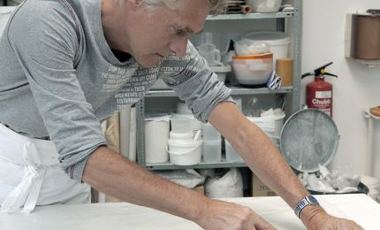 Henk Wolvers aan het werk 