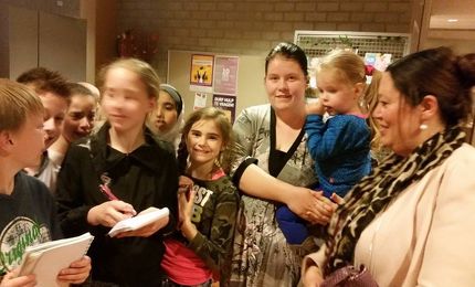 Kinderpersbureau bij de opening van de ruilkast 