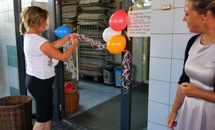 Conciergie opent de deur van Basisschool De Driestroom 